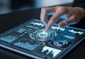 Analyst interacting with a futuristic data visualization interface on a tablet device Royalty Free Stock Photo