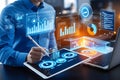 An analyst uses a computer and dashboard for data business analysis and data management system, customers database Royalty Free Stock Photo