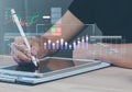 Analyst working with computer in Business Analytics and Data Management System to make report with KPI Royalty Free Stock Photo