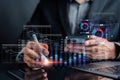 Analyst working with computer in Business Analytics and Data Management System to make report with KPI and metrics connected to Royalty Free Stock Photo