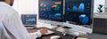 Analyst working on data analysis BI dashboard on computer monitor.Trailblazing Royalty Free Stock Photo
