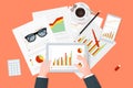 Analytic research and report on paper sheet, modern electronic and mobile devices. Work desktop top view.
