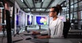 Analyzing Climate Change, A Young Woman Monitors Weather Forecast On Computer Royalty Free Stock Photo
