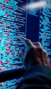 Analyzing Complex Code on Screen with Finger Pointing at Specific Line Royalty Free Stock Photo