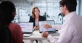 Analyzing data on analytics dashboard during multicultural team meeting Royalty Free Stock Photo