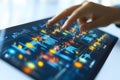 Analyzing financial data charts on a digital tablet screen close up Royalty Free Stock Photo
