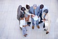 Analyzing the quarterly results. a group of diverse businesspeople discussing paperwork. Royalty Free Stock Photo