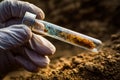 Analyzing soil samples in a laboratory test tube for environmental research Royalty Free Stock Photo