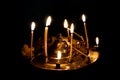 Georgia, Caucasus: Ananuri castle - burning candles in church