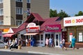 Anapa, Russia, July, 12, 2018. People walking on Krasnoarmeiskaya str. The building of the Lombard, `Treasury bonds` and the jewel Royalty Free Stock Photo