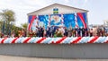 Anapa, Russia - May 1, 2019: High-ranking guests and the mayor on the stage greet the May Day demonstration on the Theater Square