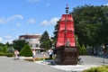 Anapa, Russia, July, 18, 2018. People walking on the promenade next to the sailboat `Scarlet sails` on Anapa resort in sunny day