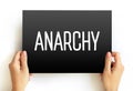 Anarchy - society being freely constituted without authorities or a governing body, text concept on card