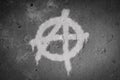 Anarchy symbol spray painted on the wall