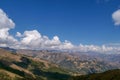 Ancash mountain range which is part of the Andes mountains, with snow capped peaks hidden under clouds in the background. Royalty Free Stock Photo