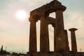 Anchient ruins of temple in Corinth, The lights of sun brights through. Greece - archaeology background Royalty Free Stock Photo