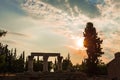 Anchient ruins of temple in Corinth, The lights of sun brights through. Greece - archaeology background Royalty Free Stock Photo