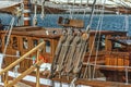 old wooden sailboat and lots of ropes