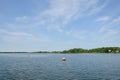 Anchor buoys specify borders on the lake Royalty Free Stock Photo