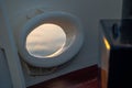 Anchor chain hole on the bow of a ship with a view of the water Royalty Free Stock Photo