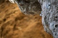 Anchor climbing on a rock wall. New iron piton. Rock climbing hook. Extreme depth of field of a fastening screw for climbing on a