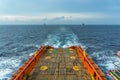 An anchor handling tug boat leaving an offshore oil field at Terengganu Royalty Free Stock Photo