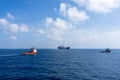 Anchor handling tug boats maneuvering at offshore oil field