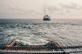 AHTS vessel doing static tow tanker lifting. Ocean tug job Royalty Free Stock Photo