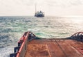 AHTS vessel doing static tow tanker lifting. Ocean tug job Royalty Free Stock Photo