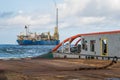 AHTS vessel doing static tow tanker lifting. Ocean tug job