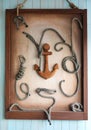 Anchor and knots as wall decoration Royalty Free Stock Photo