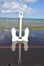 Reflecting stockless anchor on the beach of Napier, New Zealand