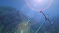 anchor under water sun ray illustration Royalty Free Stock Photo