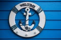 Anchor on wall background,little toy boat with anchor Royalty Free Stock Photo