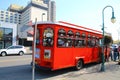 Red sightseeing bus in the city of Anchorage, Alaska, United States