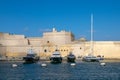 Anchorage of yachts and ships off the coast of the town of Birgu. Water space of Valletta. Fortress from the movie Troy. Malta