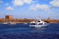 Private motor yacht approaching to anchorage in Tabarca island.