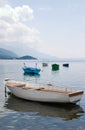 Anchored boats floating on water Royalty Free Stock Photo