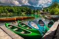 Moored canoes and wooden boats on the lake Bohinj, Slovenia