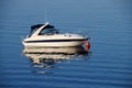 Anchored motor boat Royalty Free Stock Photo