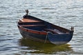 Anchored old rowboat Royalty Free Stock Photo