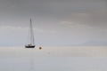 Anchored sail boat