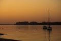 Anchored Sailing boats at sunset in Uruguay River, Entre RÃÂ­os, Argentina Royalty Free Stock Photo