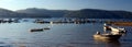 Anchored small fishing boats at the pier