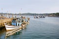 Anchored trawlers at the Arpora fishing jetty. North Goa, India.