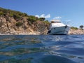 Anchored yacht off the coast of the KASTOS island, Lefkada Regional unit, Ionian Islands, Greece in summer sunny day. Royalty Free Stock Photo