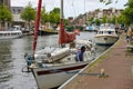 Anchored yachts in Spaarne river in Haarlem, the Netherlands