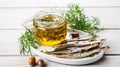 Anchovies marinated in olive oil and cooked at low temperature on a white plate. Royalty Free Stock Photo