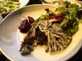 Anchovy with Black Rice / Hamsi Pilav or Pilaf served with Salad. Royalty Free Stock Photo