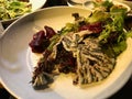 Anchovy with Black Rice / Hamsi Pilav or Pilaf served with Salad. Royalty Free Stock Photo